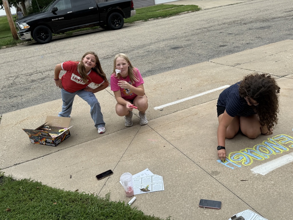 Student Leadership team creating welcome messages for the first day of school.