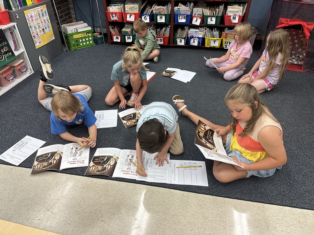Jefferson students from Mrs. Scott's class learning reading comprehension