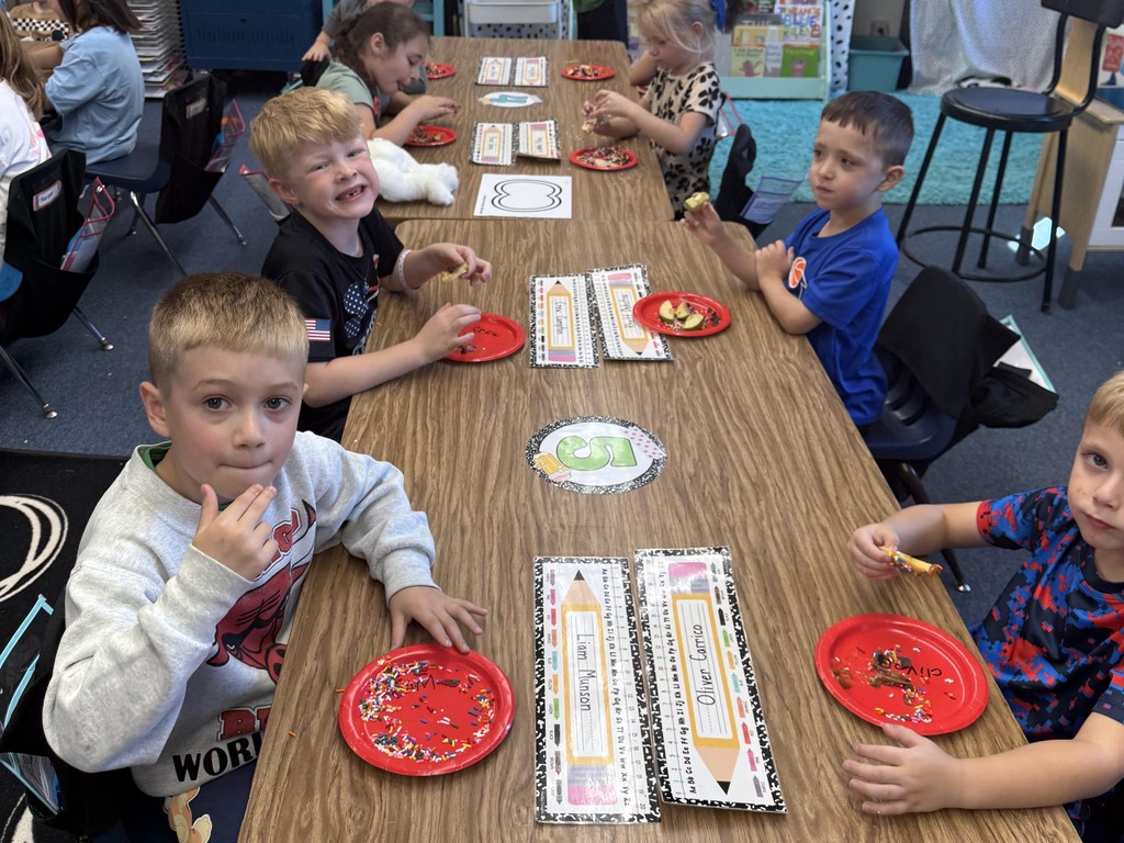 Douglas Kindergarten students celebrating Apple Day with a sweet snack