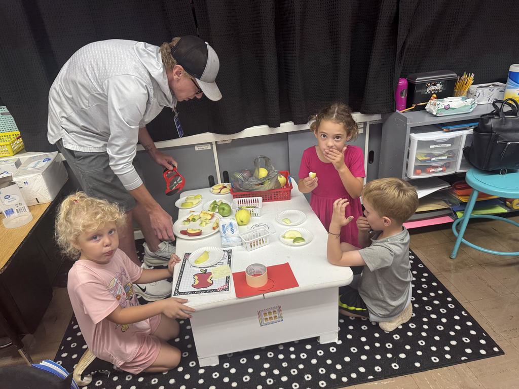 Douglas Kindergarten students celebrating Apple Day with a sweet snack