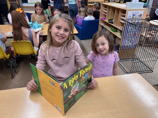 Members of Mrs. Thompson's third grade class visiting Douglas Elementary Preschoolers