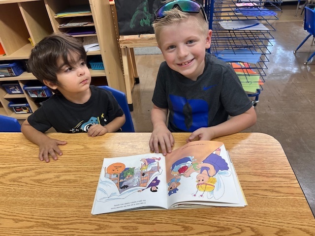 Members of Mrs. Thompson's third grade class visiting Douglas Elementary Preschoolers