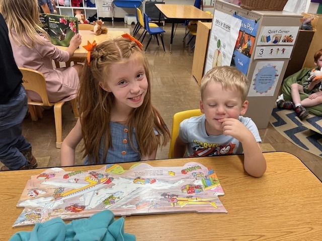 Members of Mrs. Thompson's third grade class visiting Douglas Elementary Preschoolers