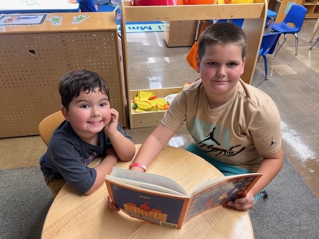 Members of Mrs. Thompson's third grade class visiting Douglas Elementary Preschoolers