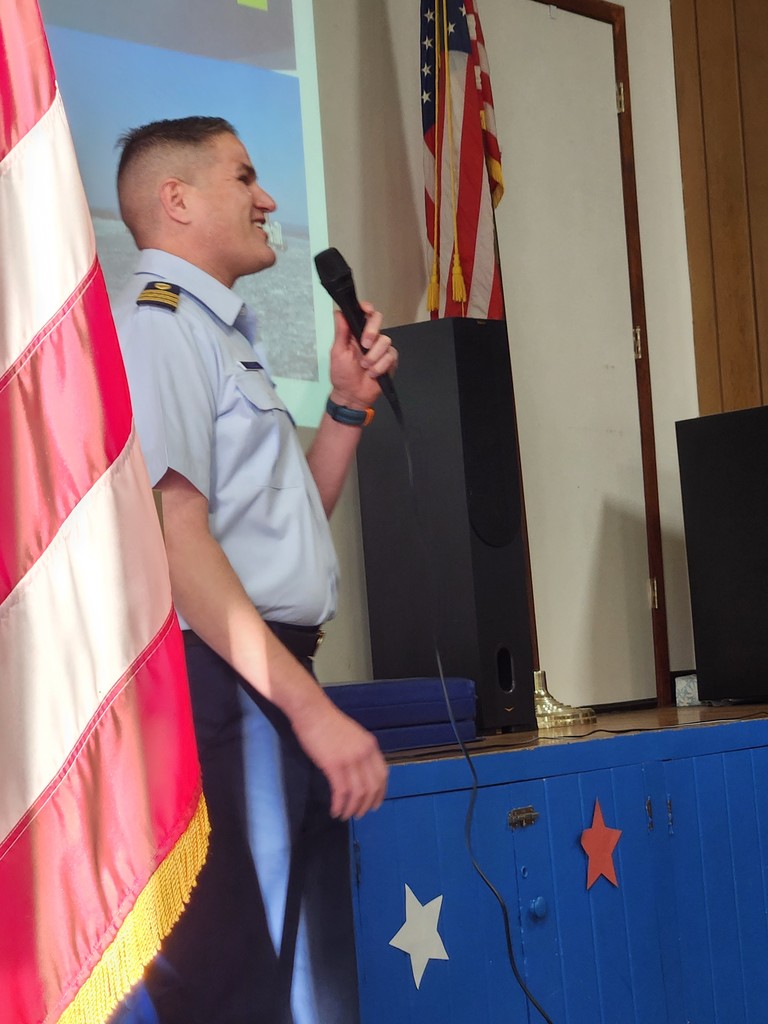 local service member addressing Lincoln student body on Veteran's Day 2025