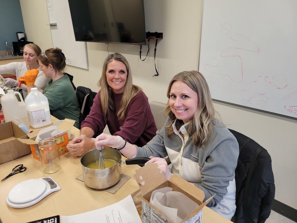 Group of women making their own soap bars