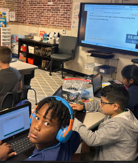 Fourth Graders working on Curipod and Sacred Reading