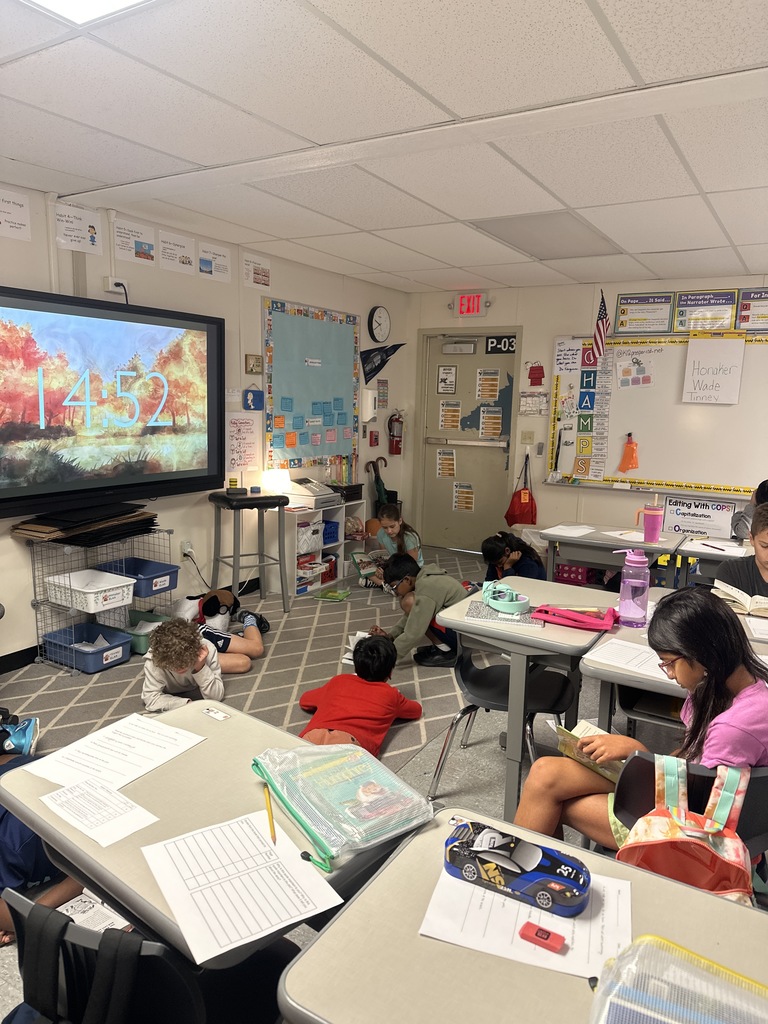 Fourth Graders working on Curipod and Sacred Reading