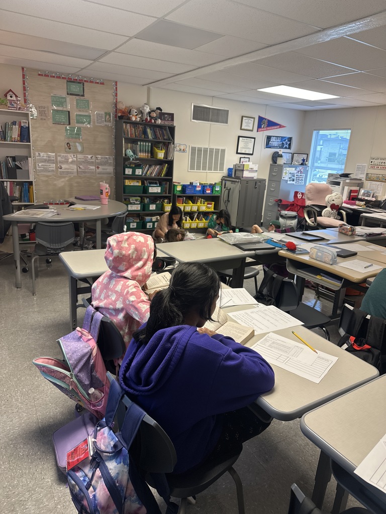 Fourth Graders working on Curipod and Sacred Reading