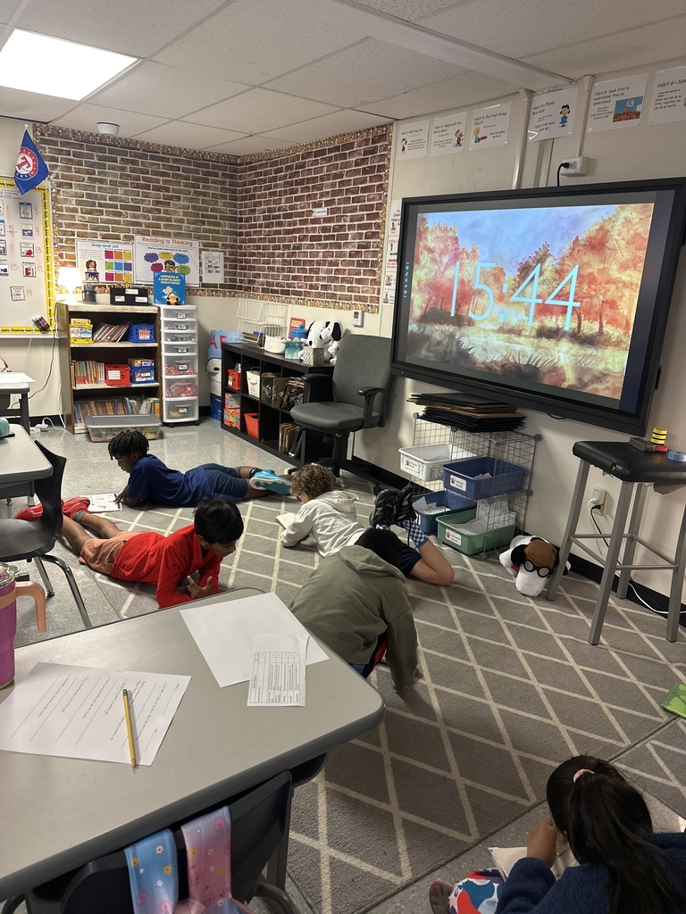 Fourth Graders working on Curipod and Sacred Reading