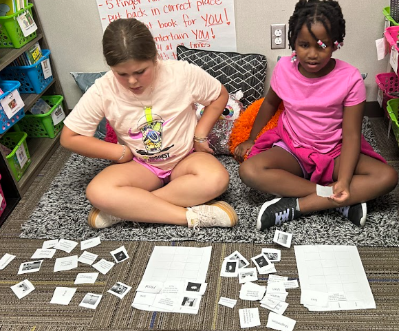Third Graders  working with partners on matter vocabulary by matching words, definitions and images.