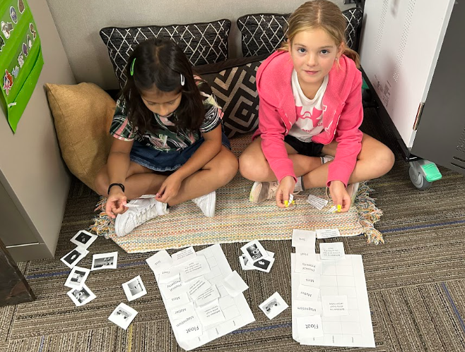 Third Graders  working with partners on matter vocabulary by matching words, definitions and images.