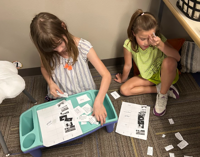 Third Graders  working with partners on matter vocabulary by matching words, definitions and images.