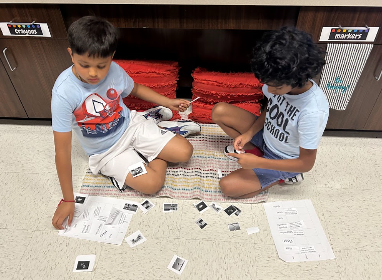Third Graders  working with partners on matter vocabulary by matching words, definitions and images.