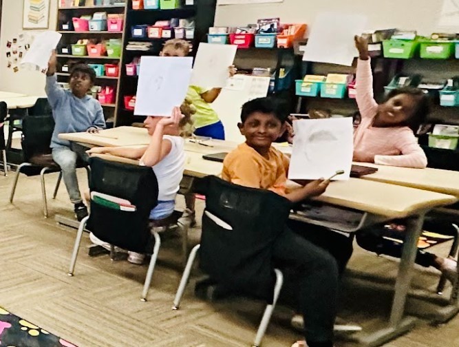 Ms. Miller's class participated in Scholastic's StoryVoice Friday with authors Peter H. Reynolds and MarcColagiovanni sharing their book The Reflection in Me.