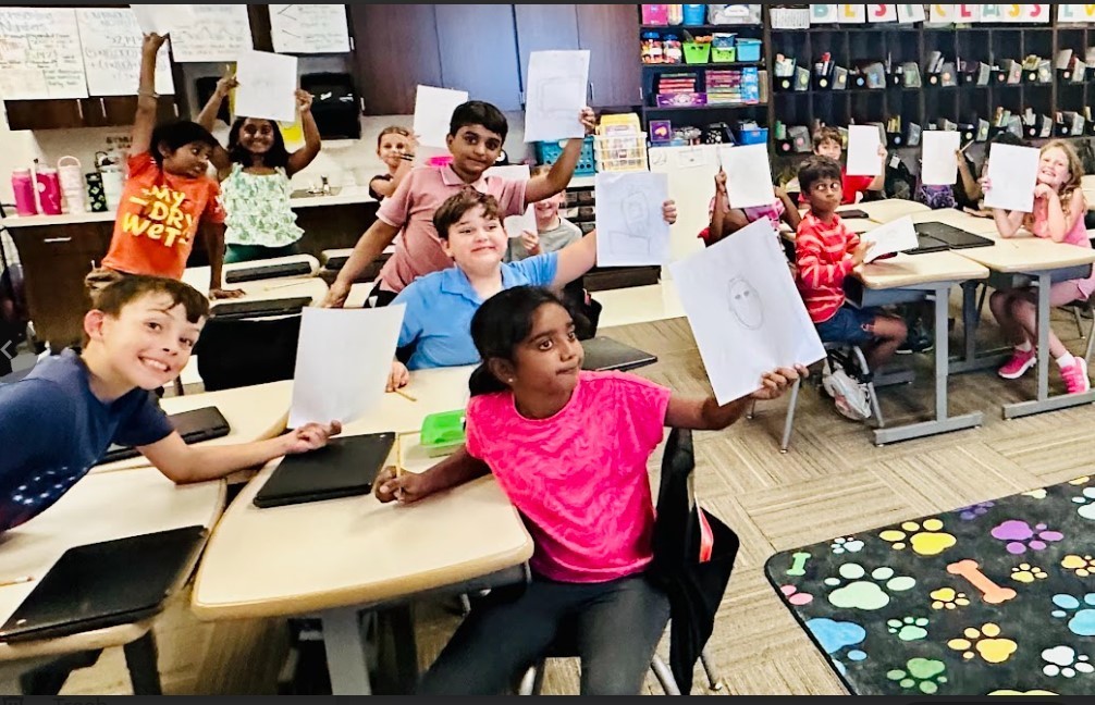 Ms. Miller's class participated in Scholastic's StoryVoice Friday with authors Peter H. Reynolds and MarcColagiovanni sharing their book The Reflection in Me.