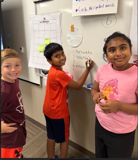 Third Graders working on vertical boards.