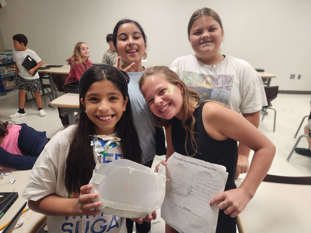 Miss Harig's fifth graders are ready to test their boats! They used the engineering design process to build boats that can hold 100 pennies without sinking.