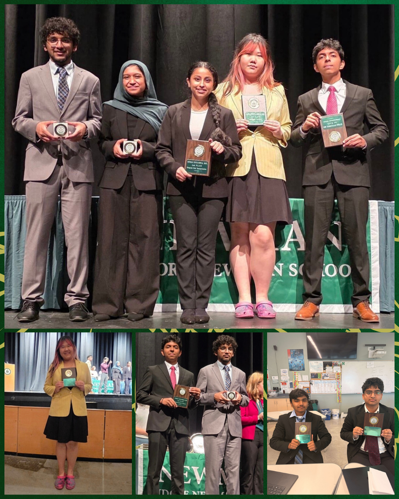 Speech & debate students posing with awards
