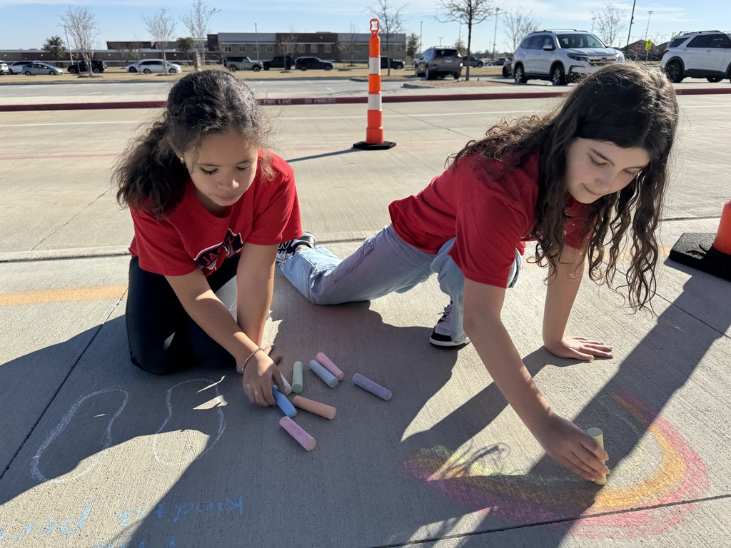 Jackson  hope students chalking kindness for students to see this week. 