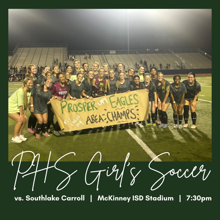 girls soccer team holding banner
