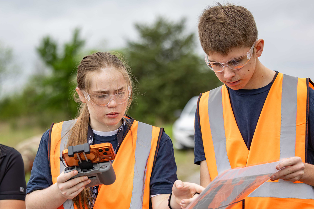 students look at map