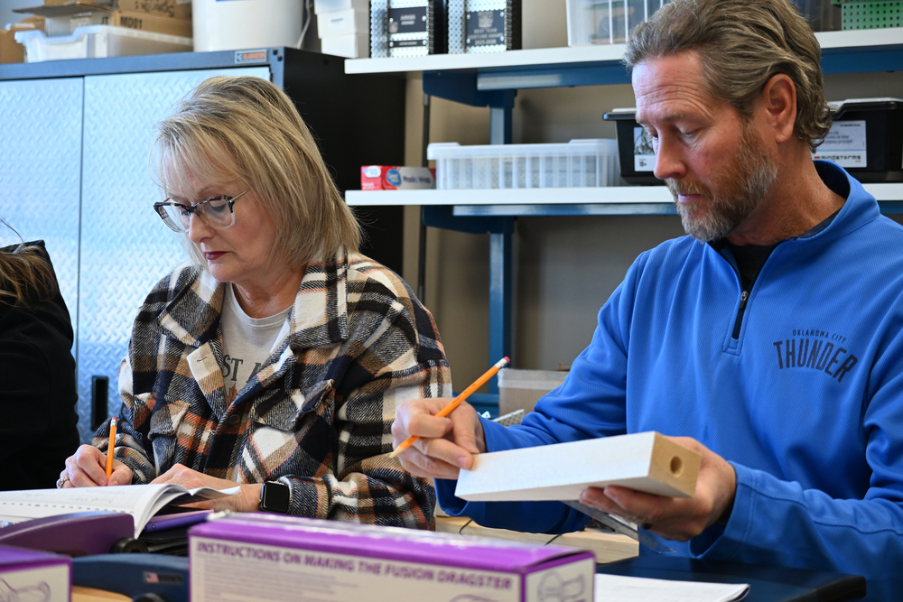 two teachers building