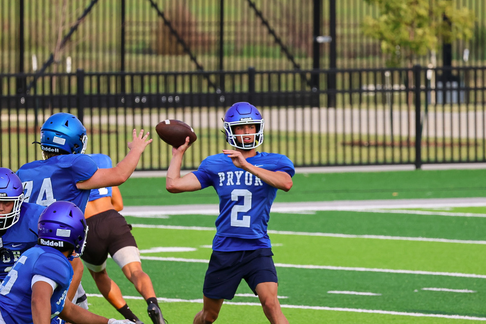 Pryor Quarterback Throwing a Pass