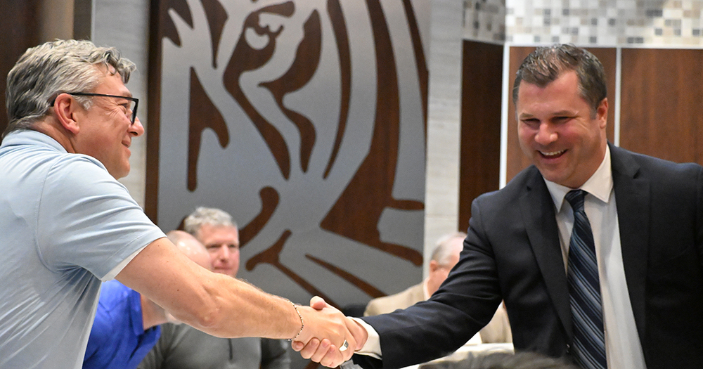 Assist supt greets new principal goss