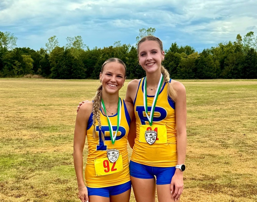 Ally Martin and Braycee Trundle after a cross country meet