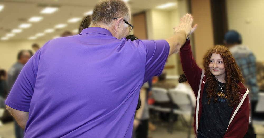 teacher student high five