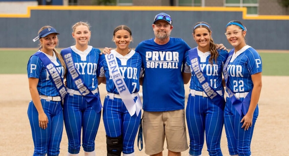 Pryor Coach Chell Looney with Pryor Seniors