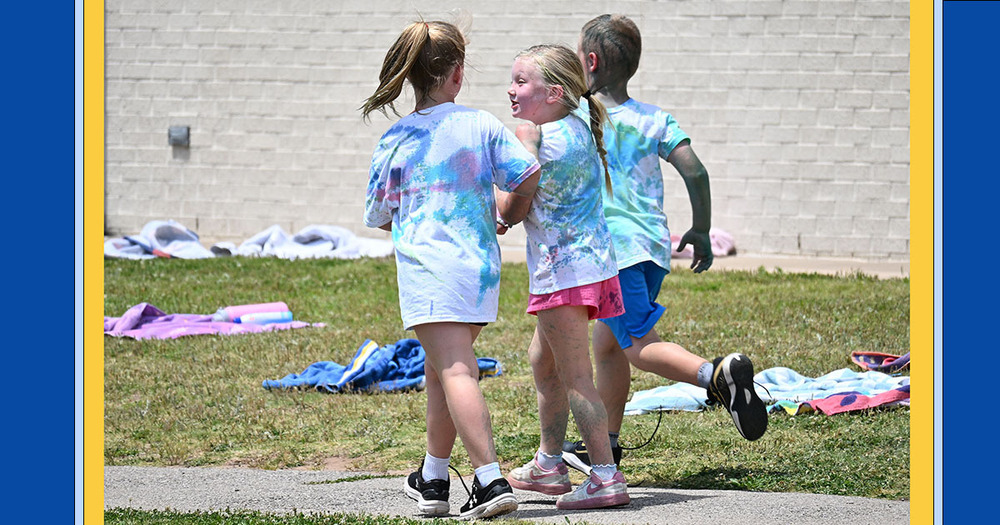 three students running