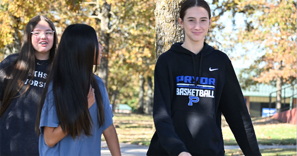 students walk on campus