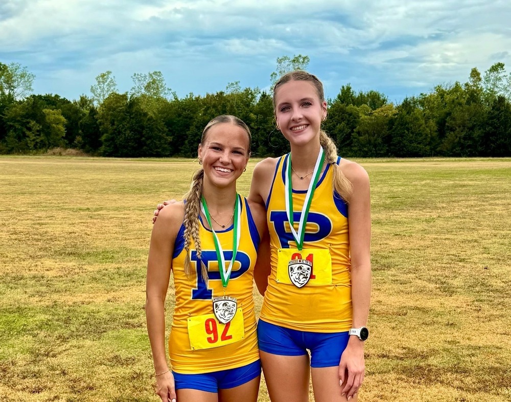Ally Martin and Braycee Trundle after a cross country meet