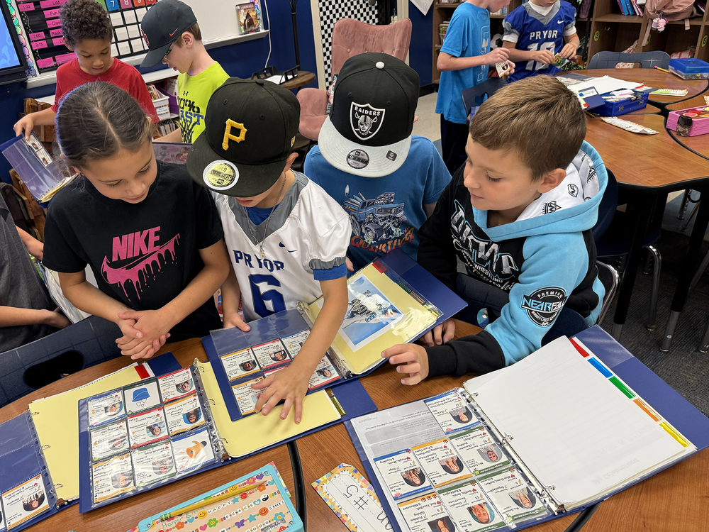 students with card b ooks