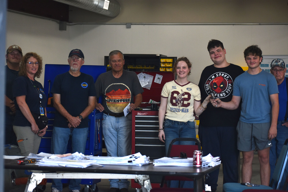 teachers, students, morris with tools