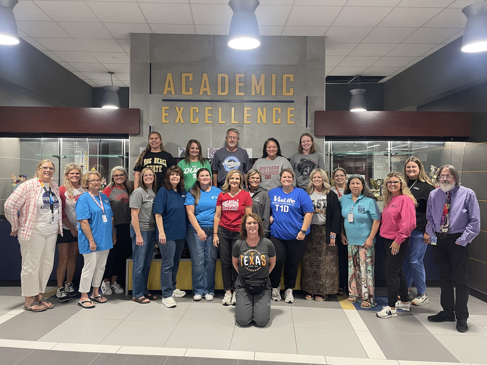 group of teachers in career shirts