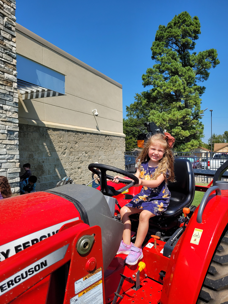 girl on tractor