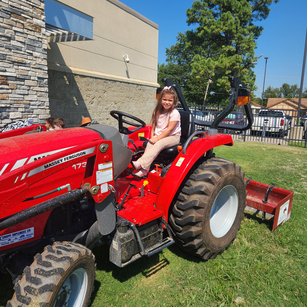 girl on tractor