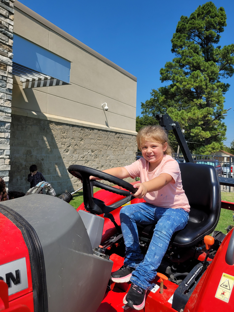 girl on tractor