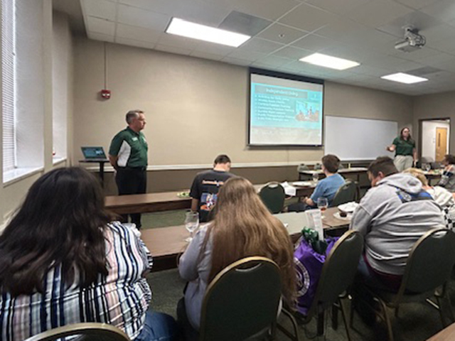 kids listening to NSU rep