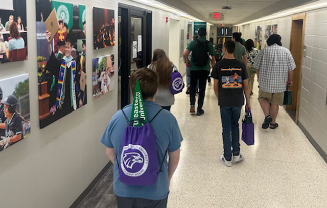kids walking down nsu hall