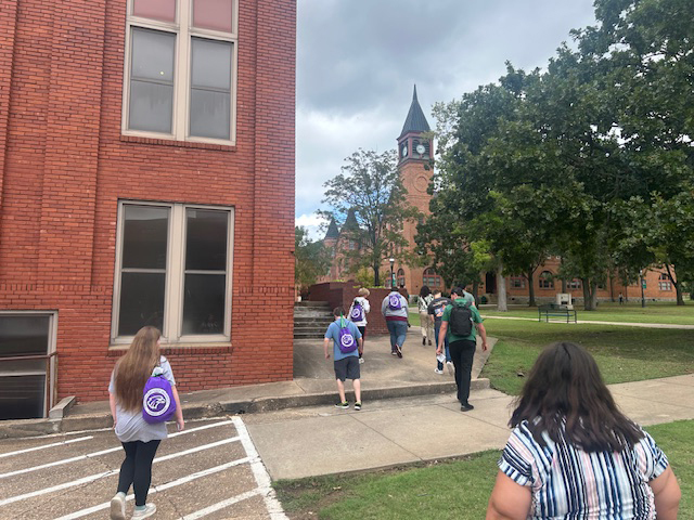 kids with scholars backpacks