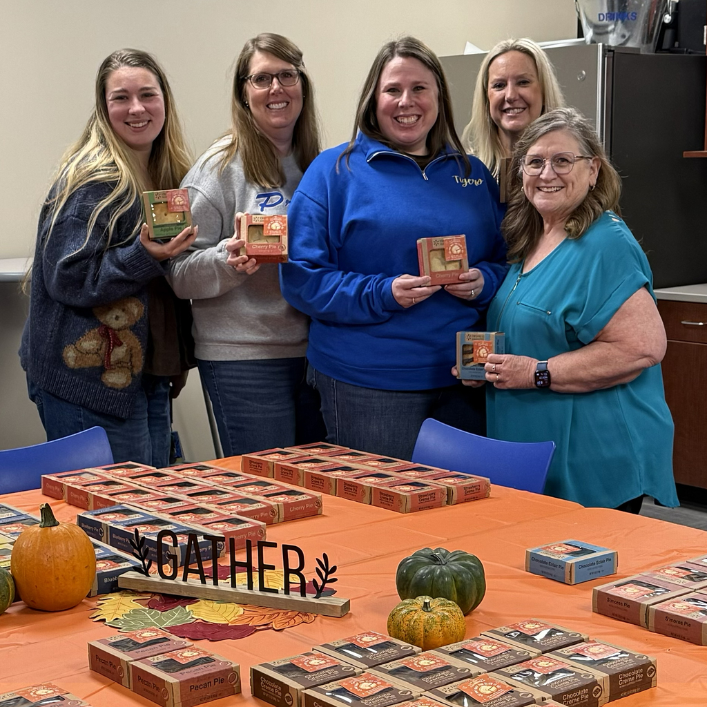 five teachers with pecn pie