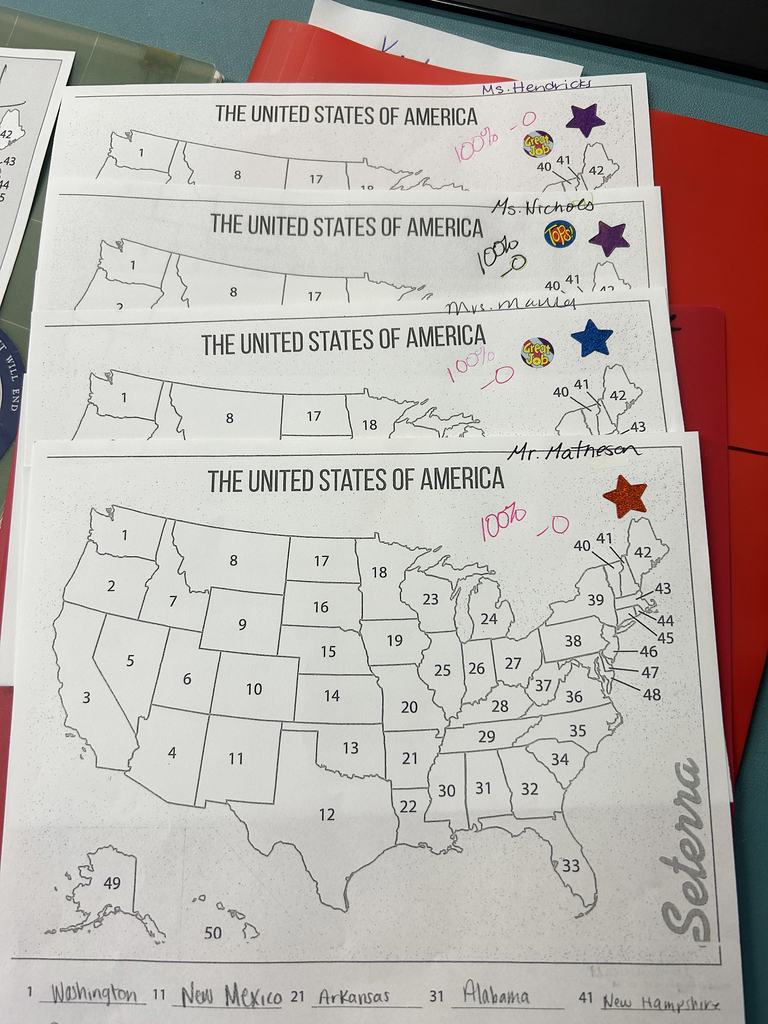 four teachers papers with 100 score