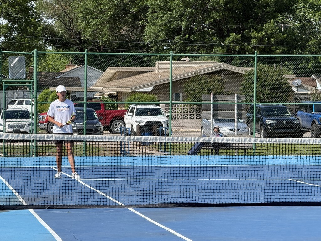 boy player stands ready to play