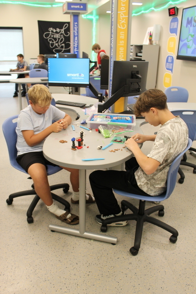 two students at table