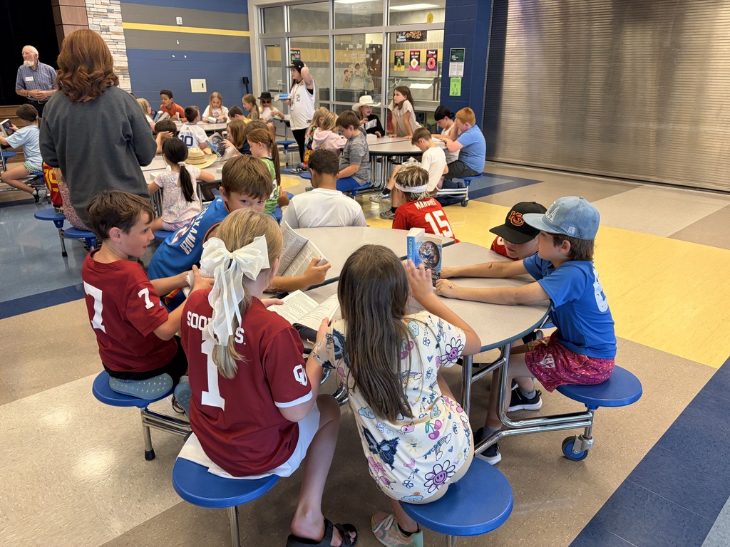 Kids reading at the table