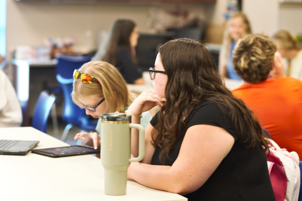 Girl looking at the teacher